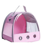 Pink small pet carrier bag with mesh sides and clear dome window front