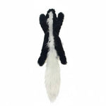 Black and white skunk-shaped plush chew toy with a long tail.