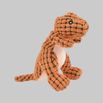 Orange animal-shaped rubber molar chew toy with textured body and black button eyes