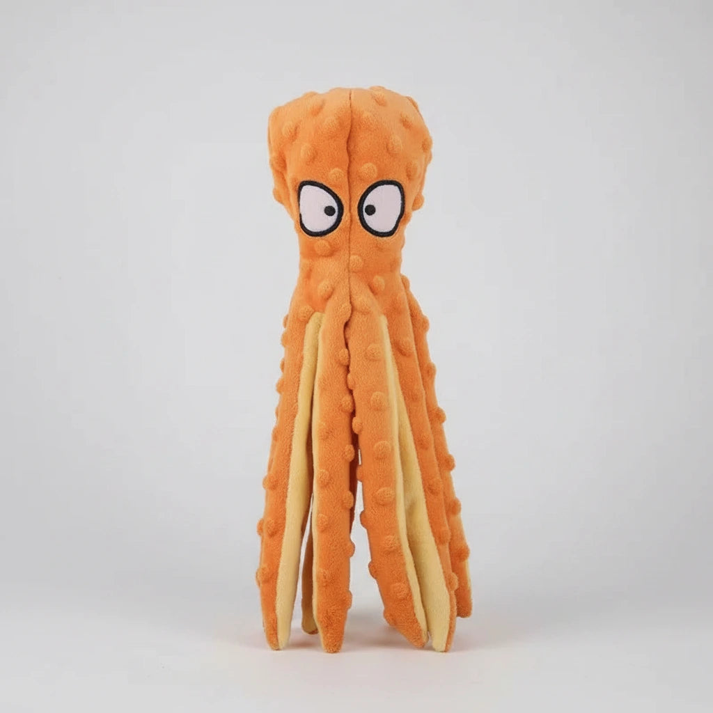Animal-shaped rubber molar chew toy, orange octopus design with textured tentacles