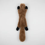 Animal-shaped chew toy, tan with black paw accents and long body