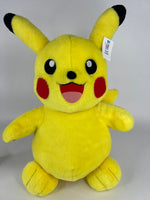 Stuffed plush dog toy, bright yellow mouse-like character with smiling face and long ears