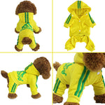 Yellow four-leg pet hoodie with hood, green stripe trim and front logo print