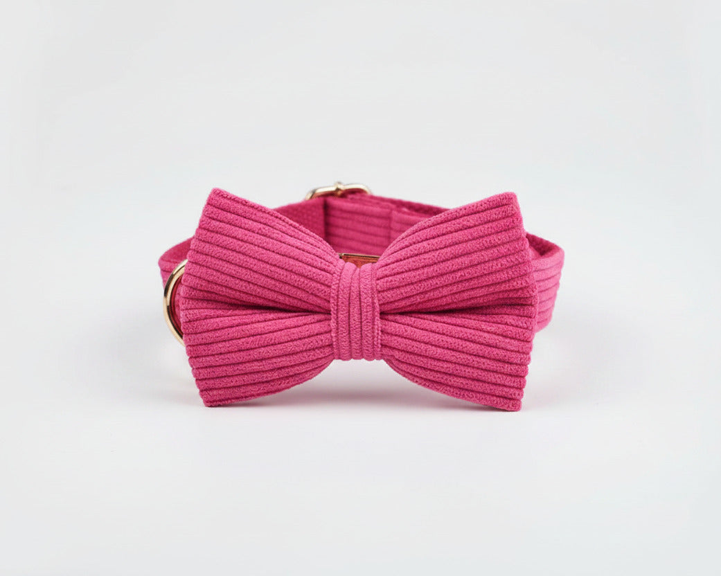 Pink corduroy bow tie accessory with small metal clasp