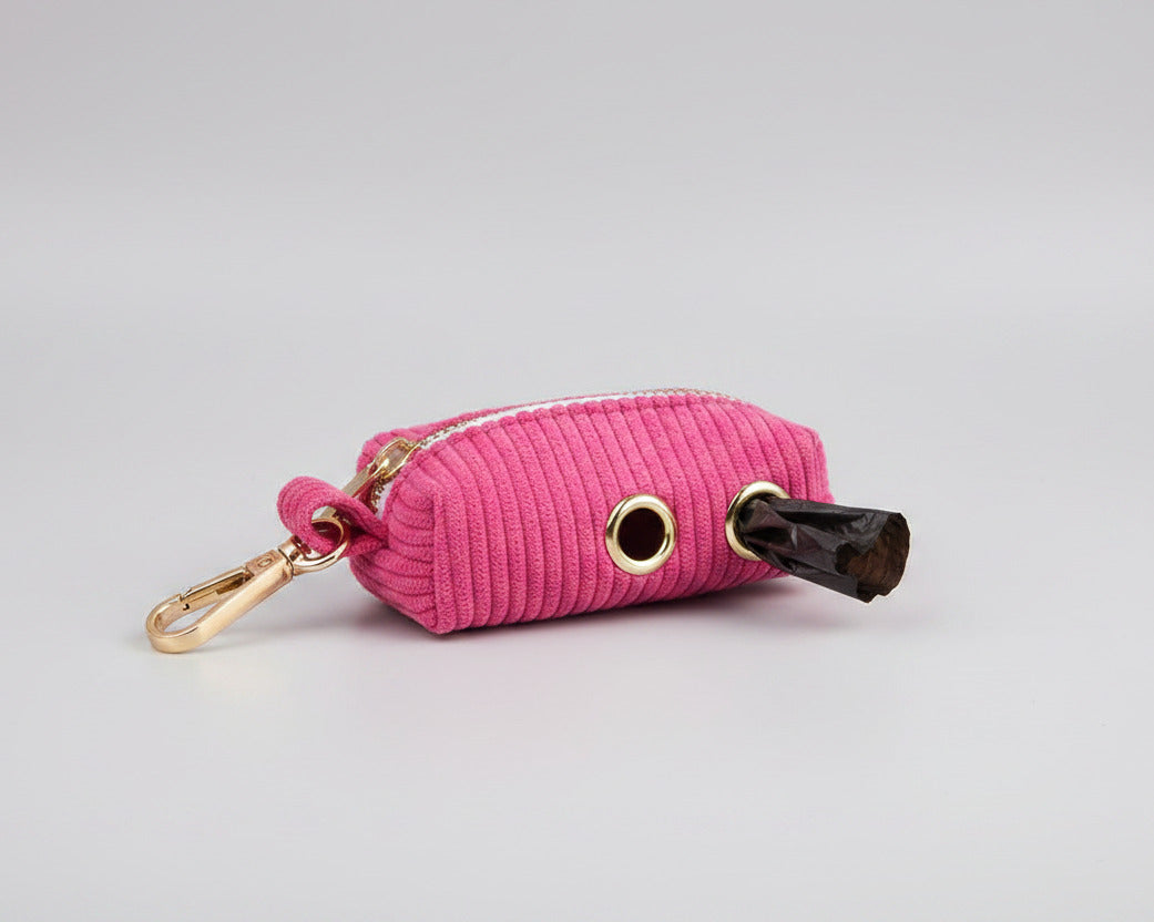 Red corduroy poop bag holder with gold clasp and carabiner hook