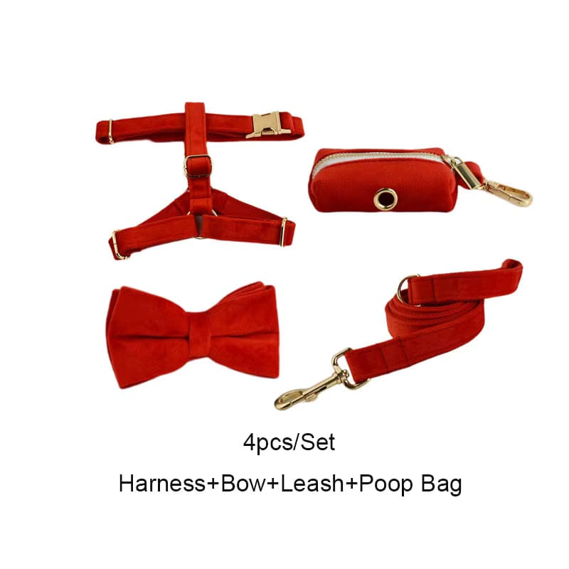 Red velvet dog harness set with bowtie, leash, and small poop bag pouch