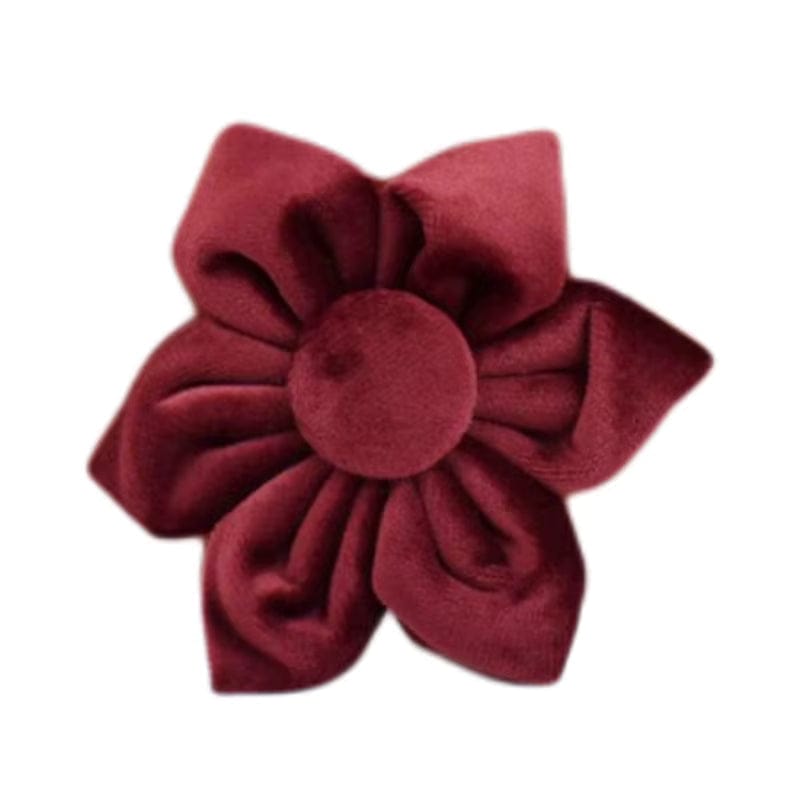 Burgundy velvet flower accessory with layered petals and central rosette