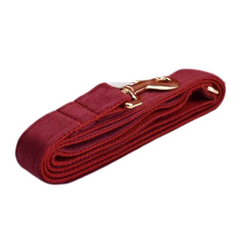 Burgundy velvet dog leash with gold-tone clasp and rolled strap