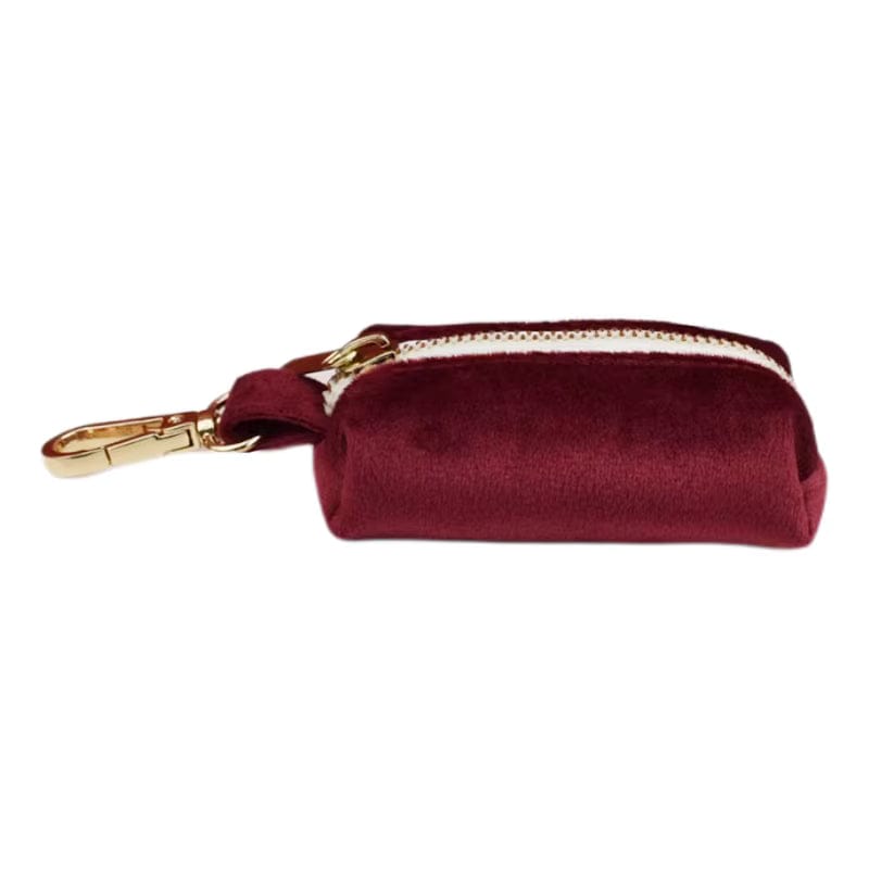 Burgundy velvet poop bag holder with zipper and gold-tone clip
