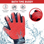 Red silicone bath grooming glove with raised nubs, shown with water splashes