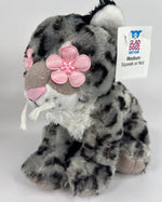 Gray and black spotted plush dog toy with pink bow nose, squeaker tag