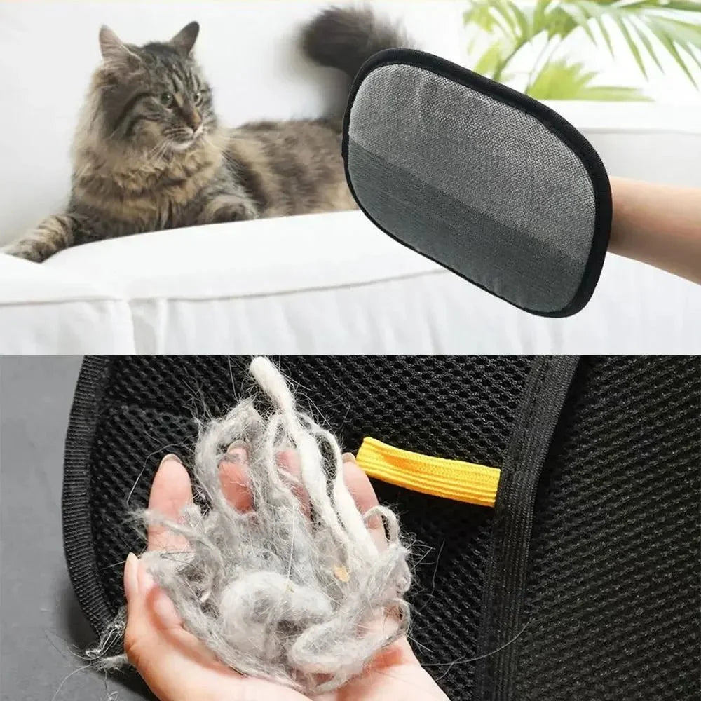 Black pet grooming mitt with gray inner pad and yellow tab, held for brushing