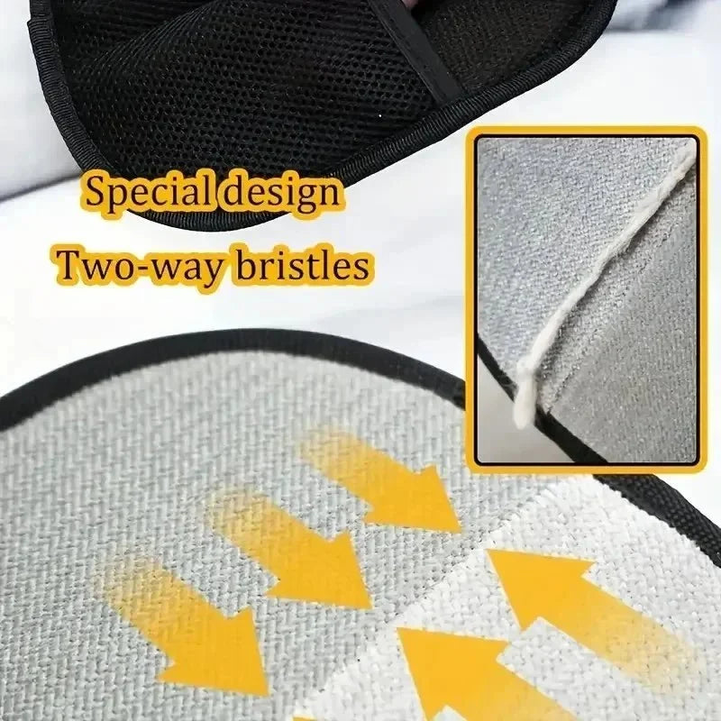 Black grooming mitt with yellow tab and textured two-way bristle pattern on mesh