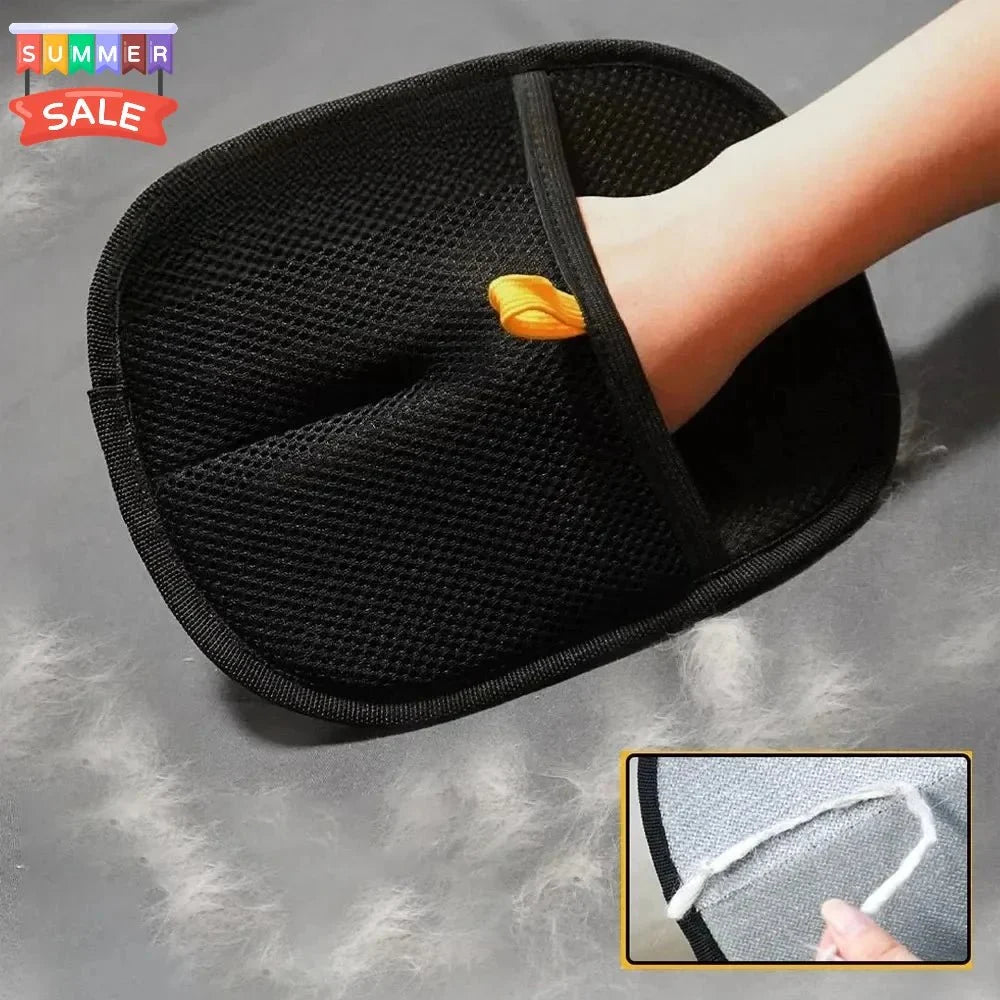 Black pet grooming mitt on hand, textured hair-removal surface with yellow tab