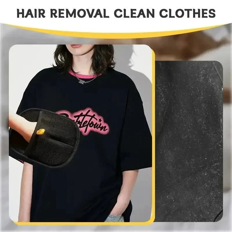Black pet grooming hair removal glove with yellow strap, held in front of shirt