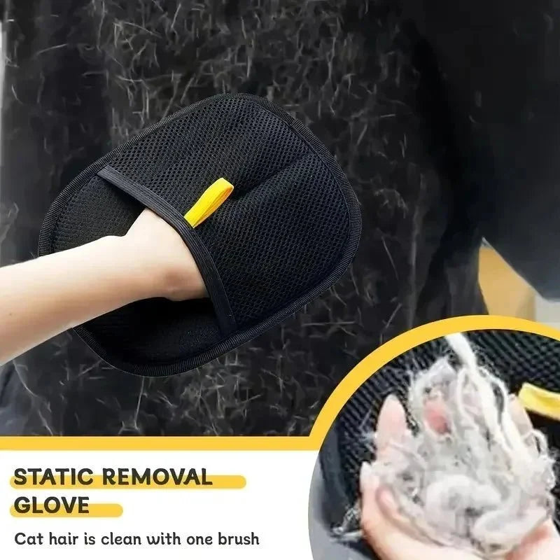 Black mesh grooming mitt with yellow tab and curved shape, hand shown brushing fur