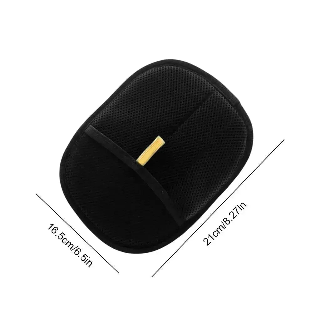 Black pet grooming hair-removal mitt with yellow tab, size markings shown