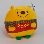 Holiday squeaky plush Winnie the Pooh ball toy with striped red scarf