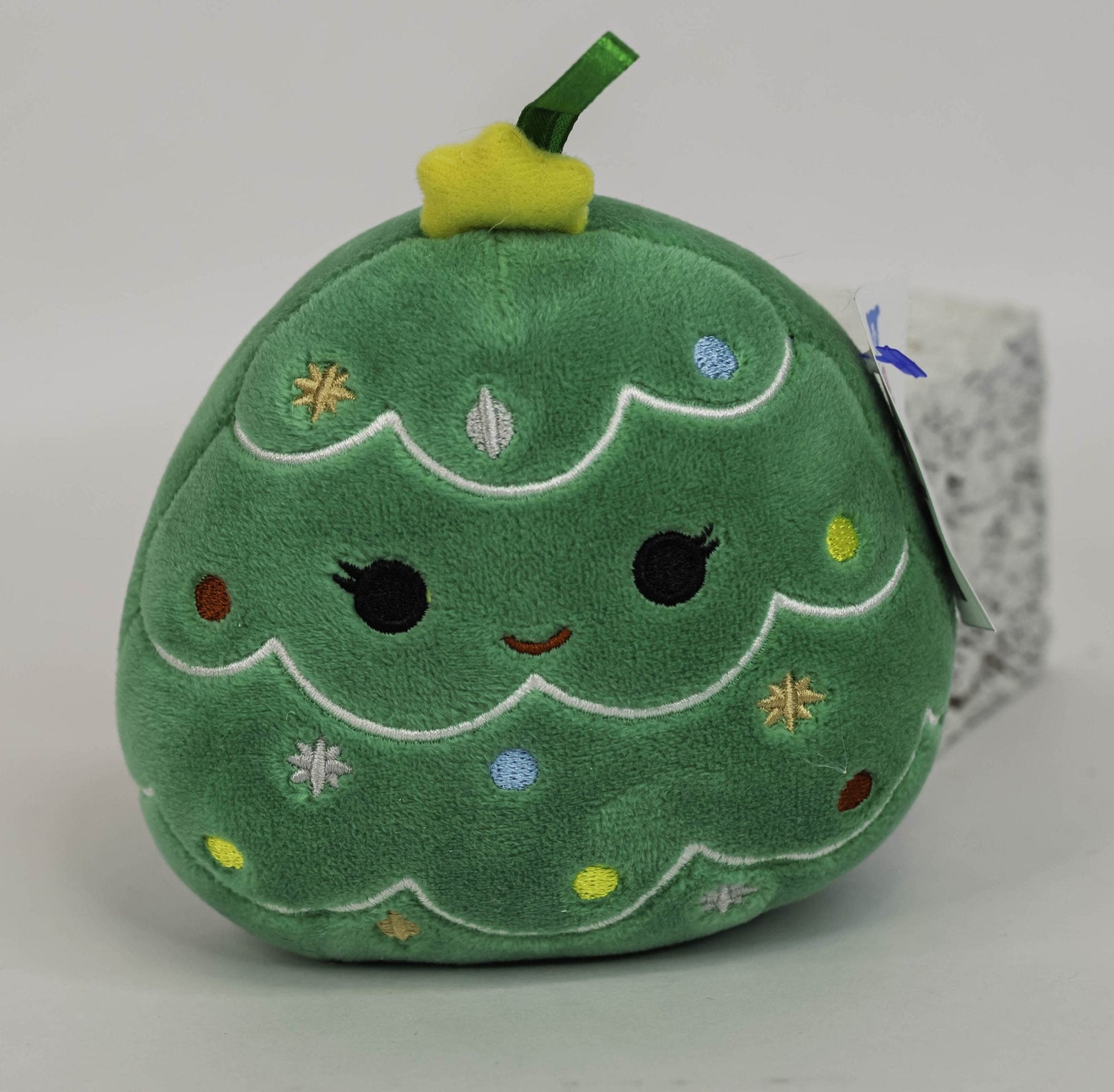Holiday squeaky plush Christmas tree ball toy in green with cute face