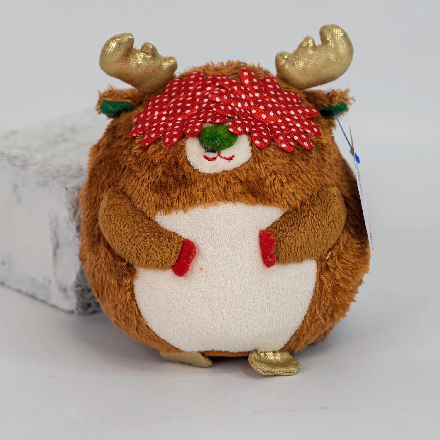 Holiday squeaky plush reindeer ball toy with red dotted scarf and antlers