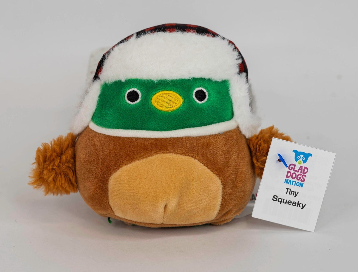 Holiday squeaky plush penguin toy in white and green with yellow beak