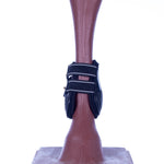 Navy fetlock boot with two-strap closure around the fetlock