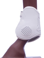 White fetlock boot front with perforated circular panel