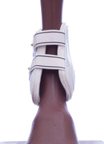 White fetlock boot with open top and double hook-and-loop straps