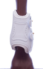 White fetlock boot side profile with molded support and straps