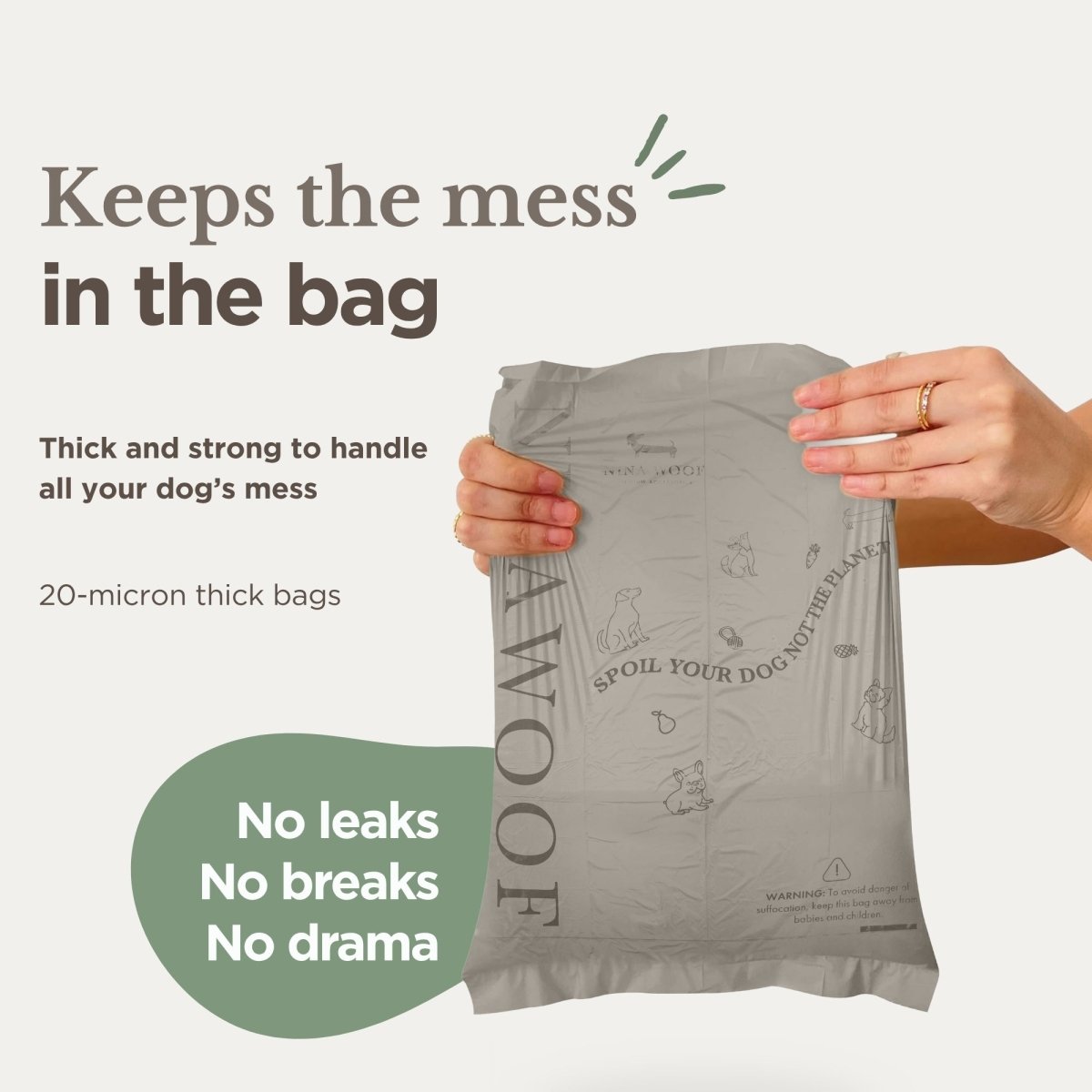Thick compostable dog waste bag pouch held in hands, light gray-beige