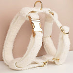 Off-white teddy knit pet harness with gold-tone straps and clip hardware