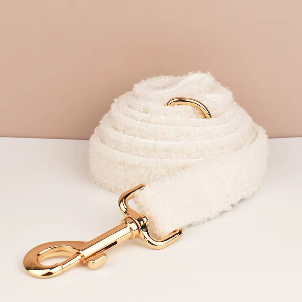 Off-white teddy knit pet leash with gold-tone clasp and curved handle ring
