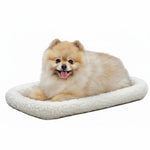 White fleece pet bed with raised rim, dog resting inside