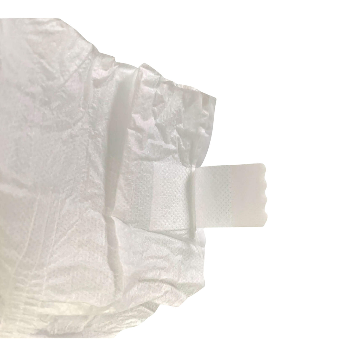 Disposable diaper detail with side tabs and layered absorbent pad