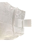Disposable diaper detail with side tabs and layered absorbent pad