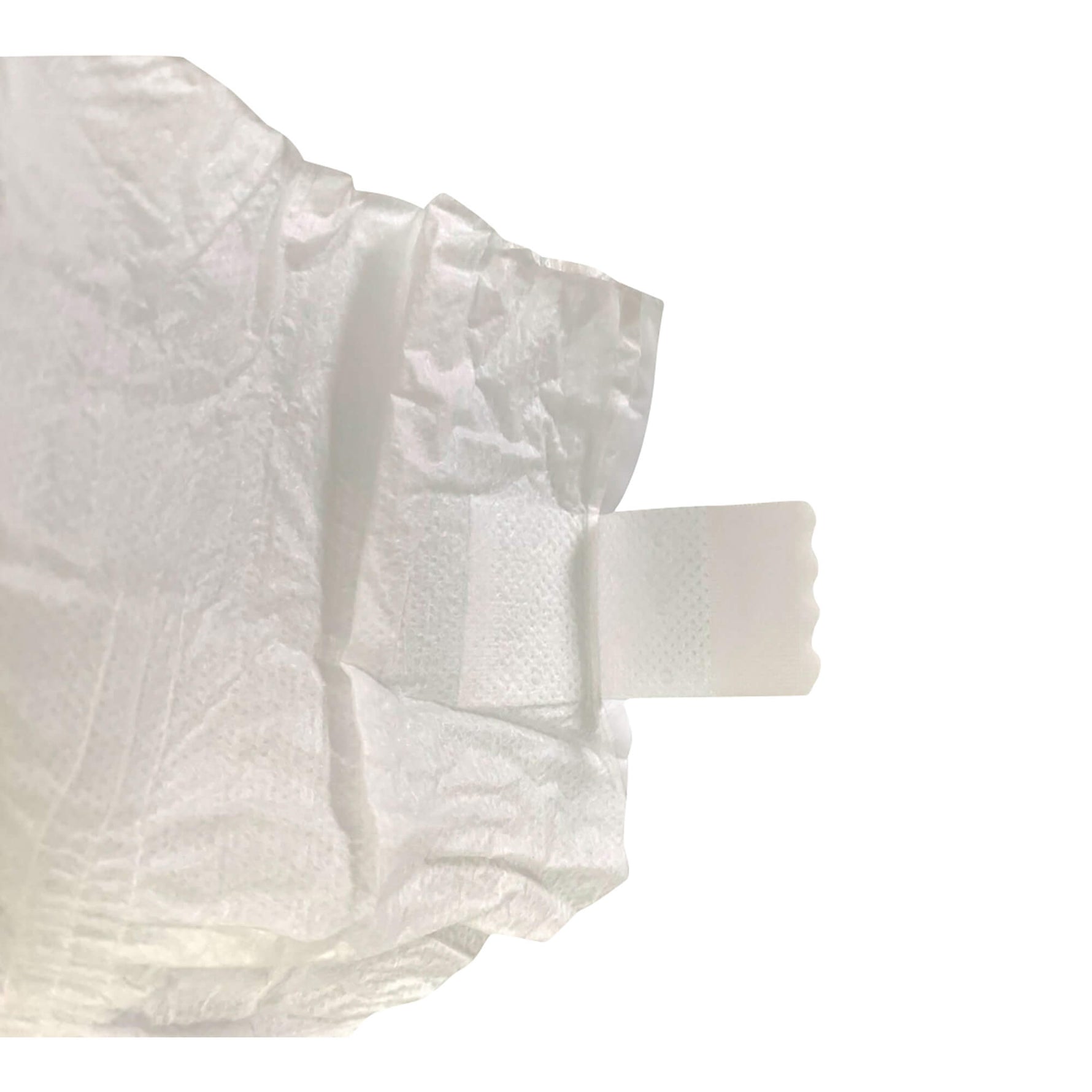 Disposable diaper detail with side tabs and layered absorbent pad